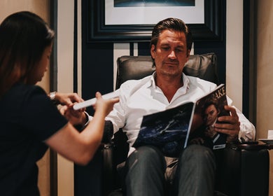 Gentleman enjoying services at Barberia Italiana Grooming Lounge Ltd., Dubai, Dubai, AE.