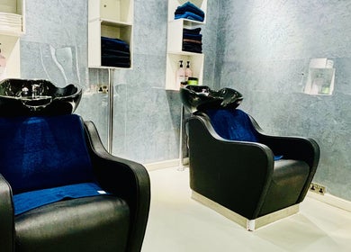 Modern salon wash stations at Glitz Beauty Center, Dubai, AE with sleek design and luxury comfort.