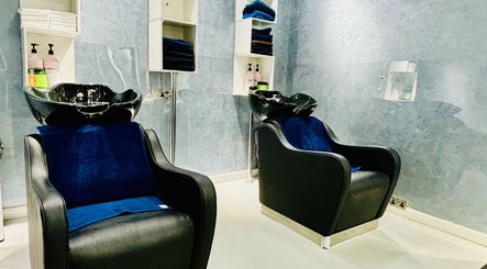 Modern salon wash stations at Glitz Beauty Center, Dubai, AE with sleek design and luxury comfort.