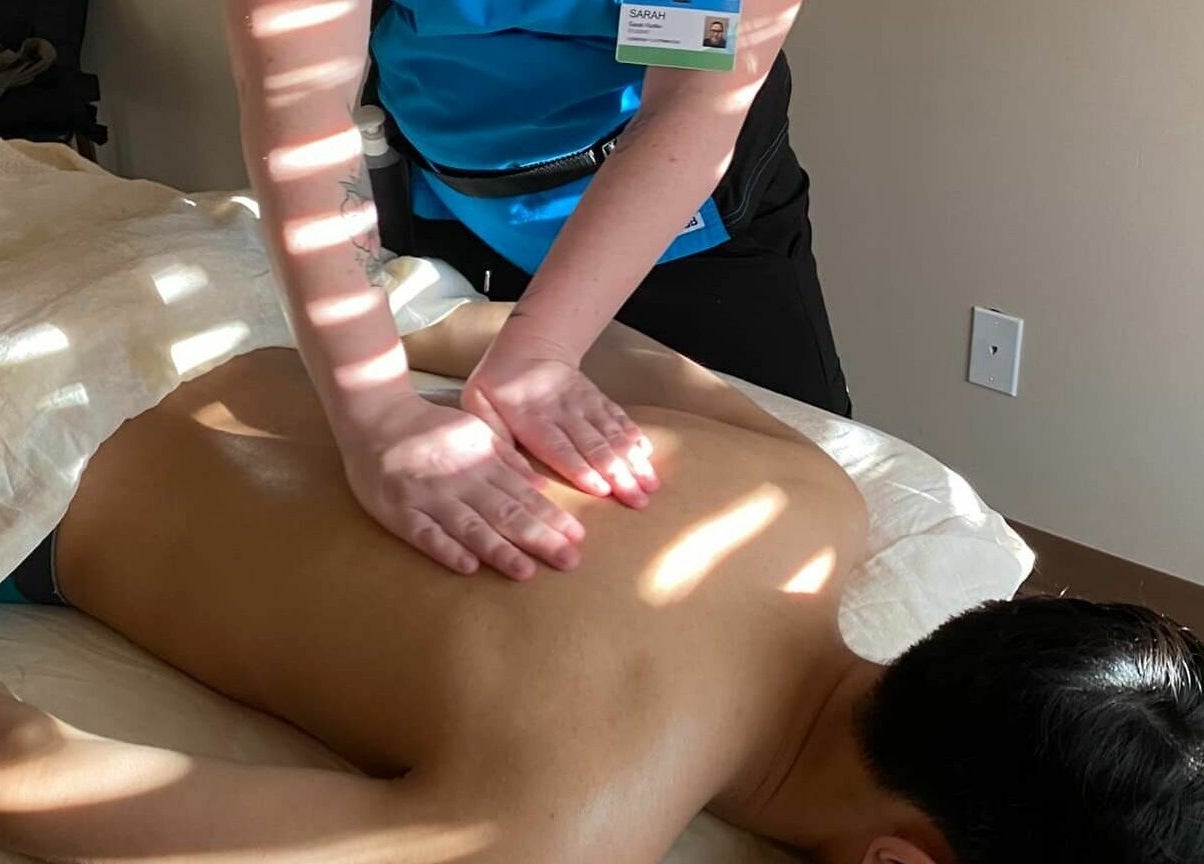 Relaxing massage at Wisdom Health Holistic Wellness Center in Wainwright, Alberta, CA, enhancing well-being.