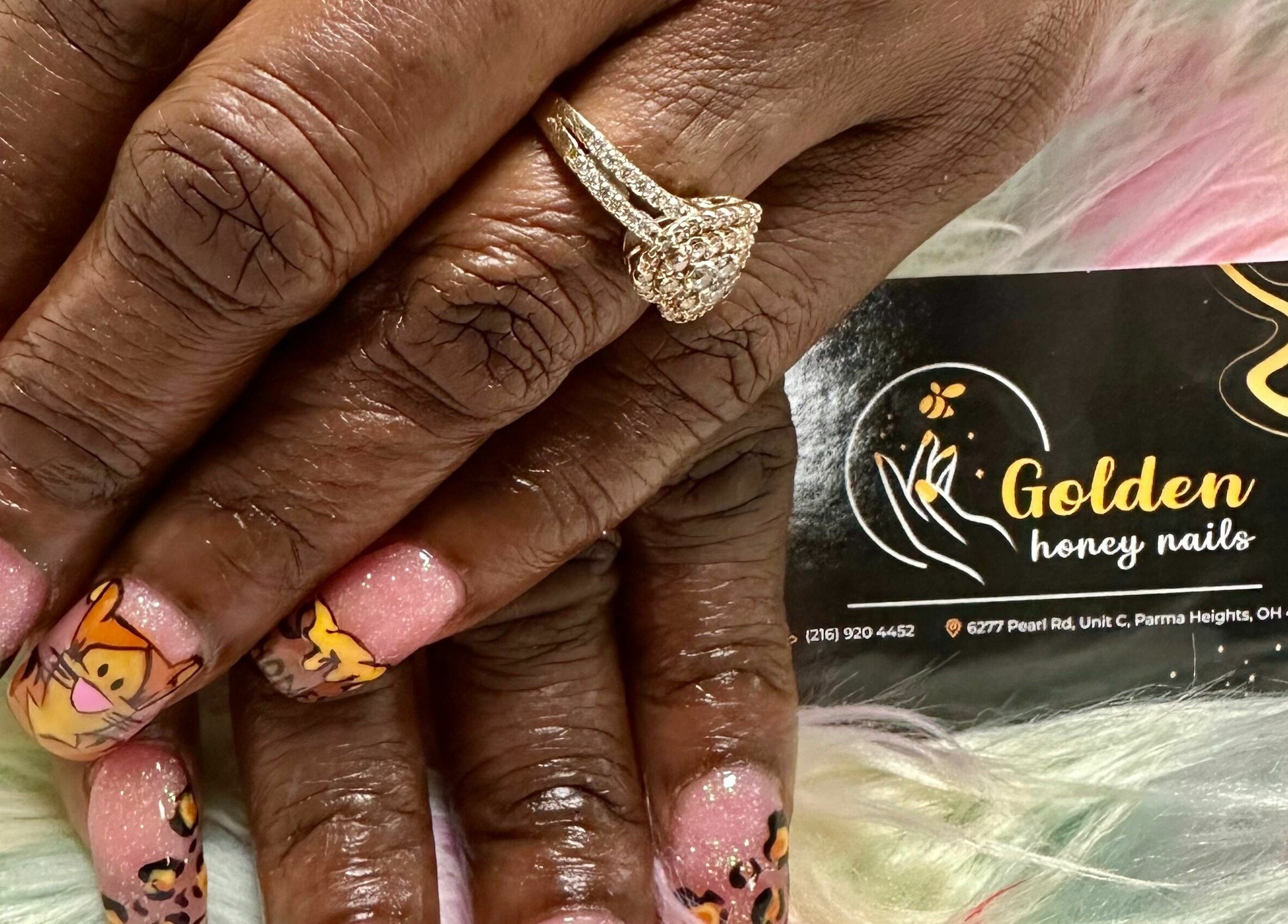 Elegant nail art design at Golden Honey Nails and Spa in Parma Heights, Ohio, US, featuring intricate details.
