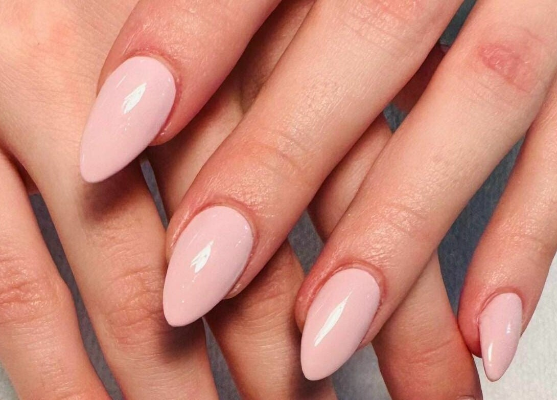 Elegant manicured nails at Golden Honey Nails and Spa, Parma Heights, Ohio, US showcasing glossy pastel finish.
