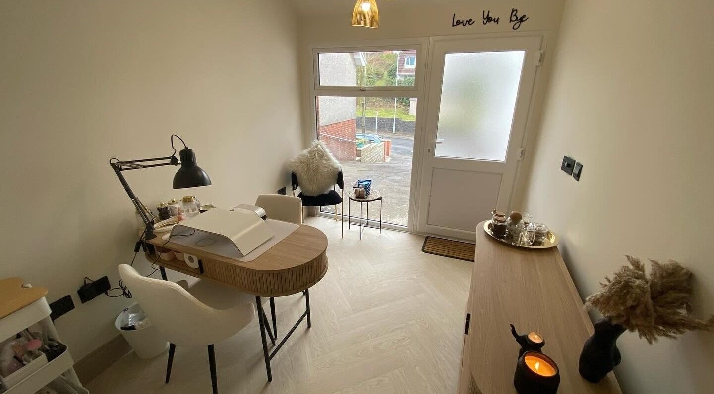 Cozy treatment room at Rebecca Kift Beauty, Swansea, Wales, GB with stylish decor and serene ambiance.
