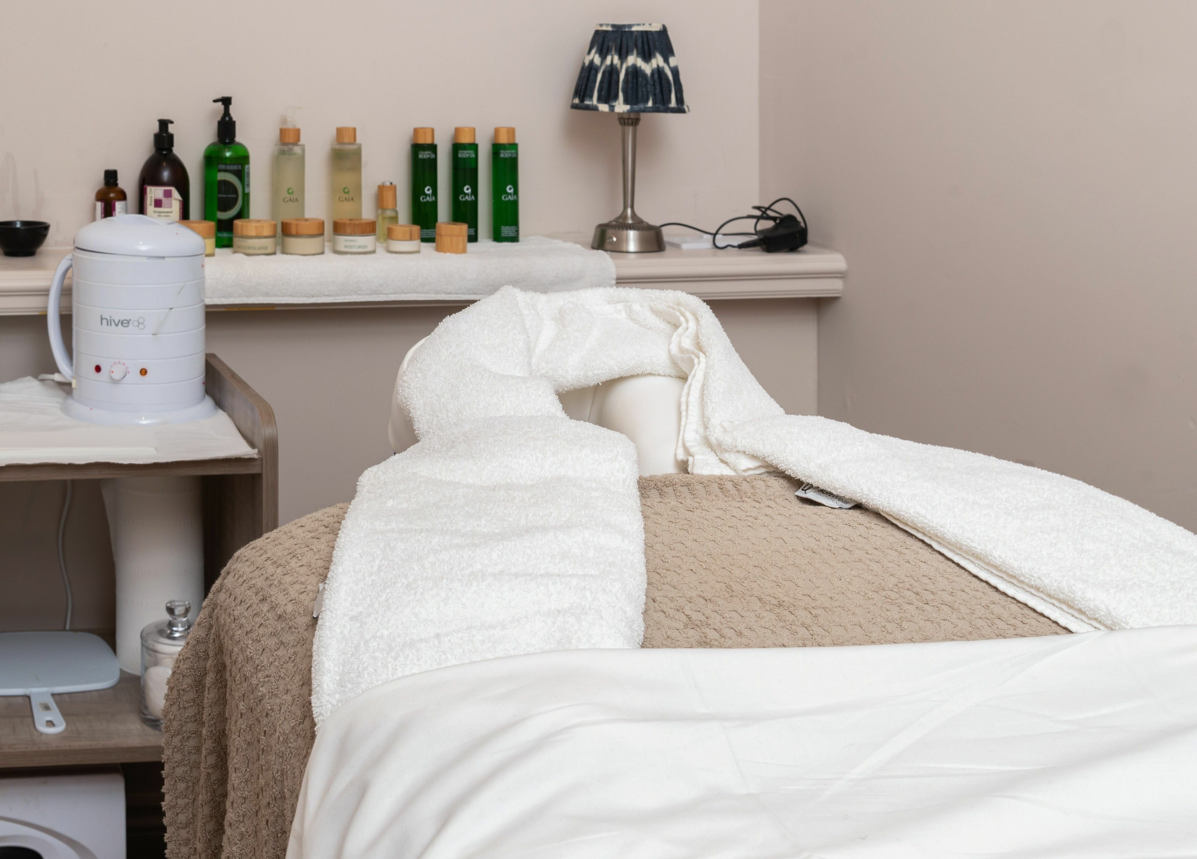 Relaxing spa treatment room at Elcot Park Retreat, Newbury, England, GB with soothing decor and calming ambiance.