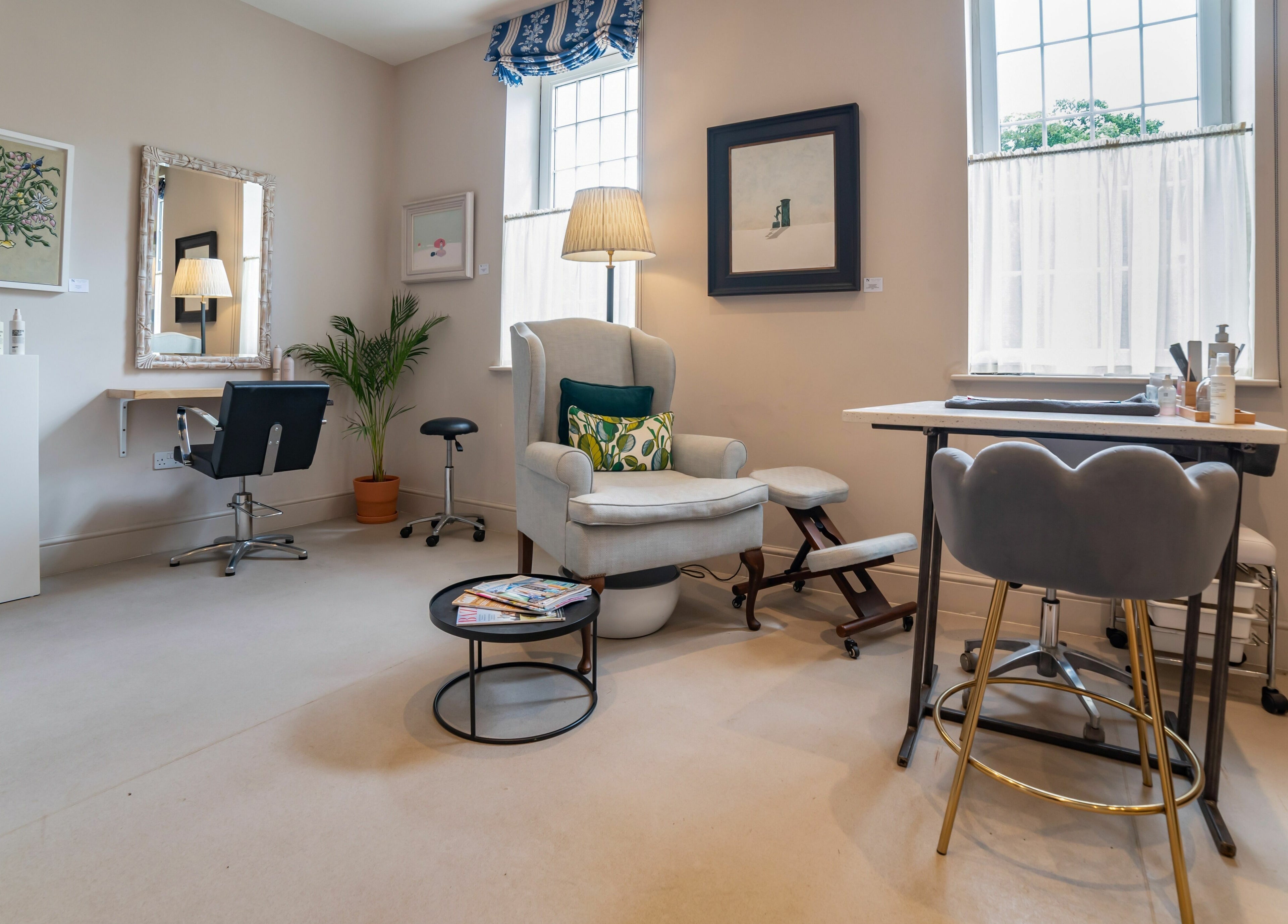 Cozy beauty room at Elcot Park Retreat, Newbury, England, GB, with plush chairs and decor.