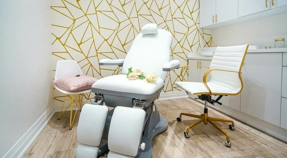 Modern spa room with elegant chair at Fusionmed Cosmetic (Stouffville), Whitchurch-Stouffville, Ontario, CA.
