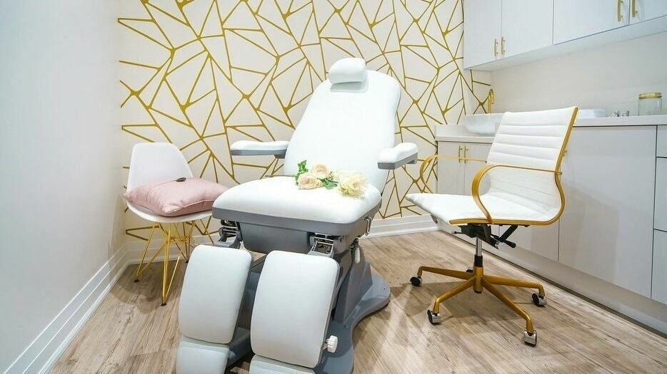 Modern spa room with elegant chair at Fusionmed Cosmetic (Stouffville), Whitchurch-Stouffville, Ontario, CA.