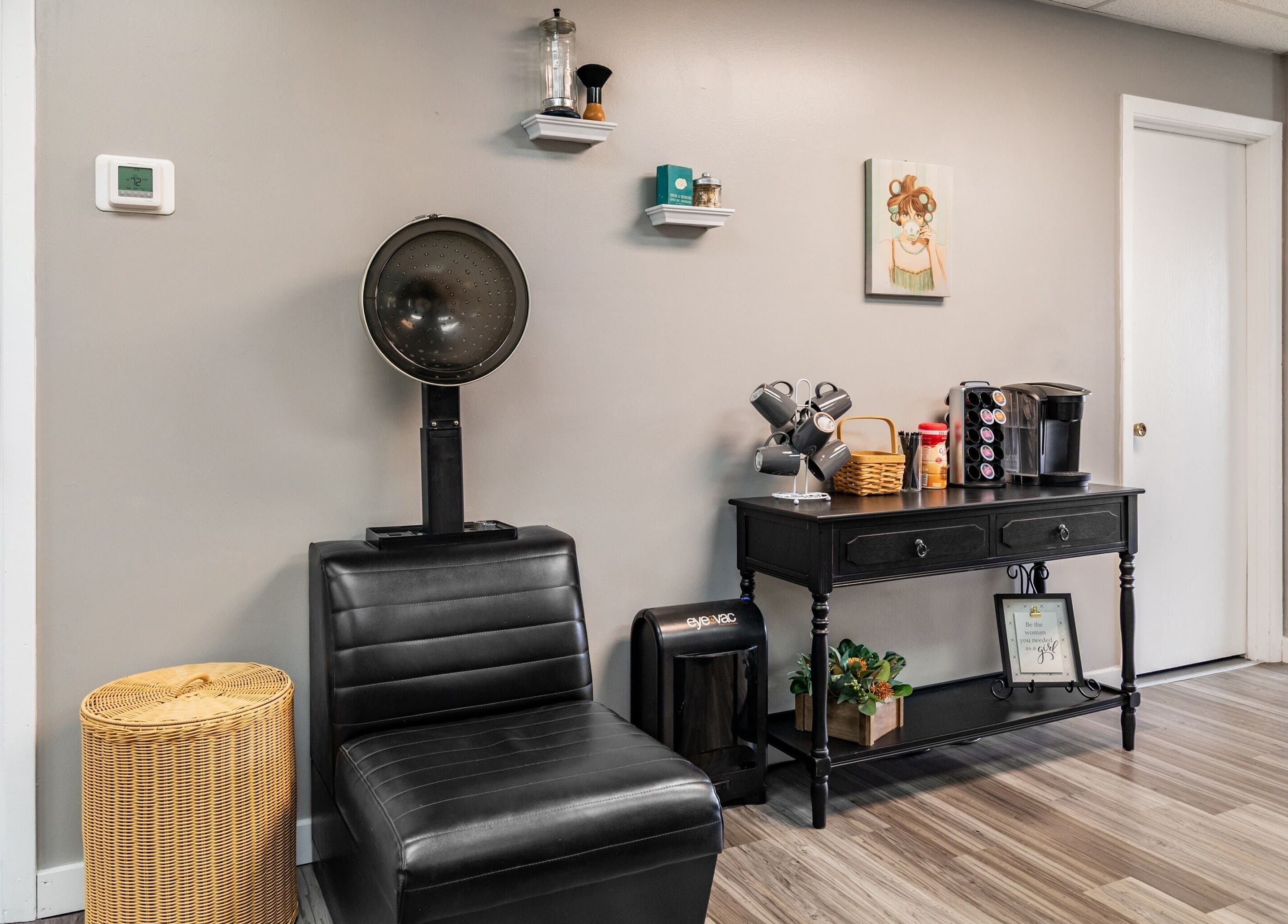 Stylish waiting area at EYB Confidence Studio in Elyria, Ohio, US featuring modern decor and seating.