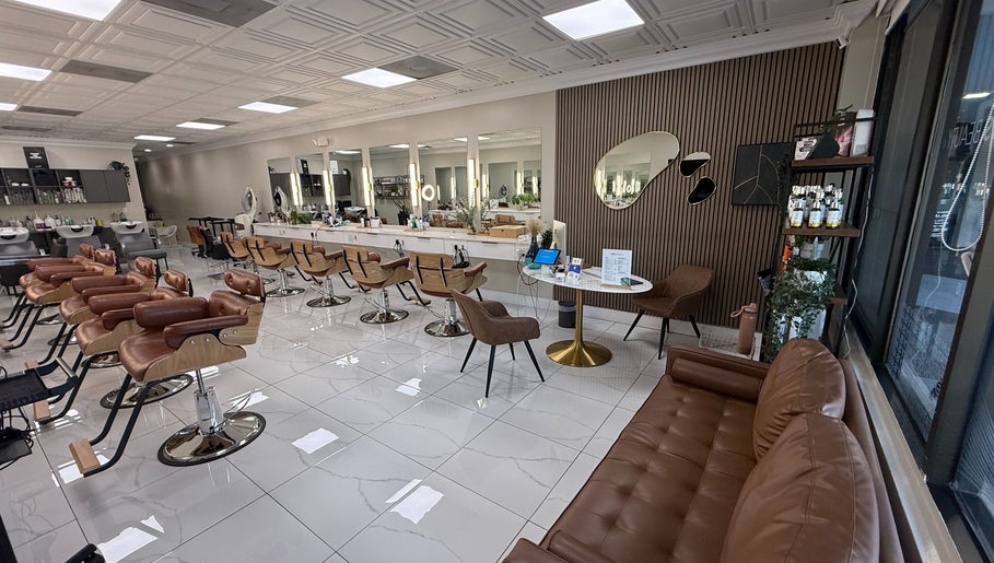 Modern interior of Fios Beauty salon, Miami, Florida, US, featuring stylish chairs and elegant decor.