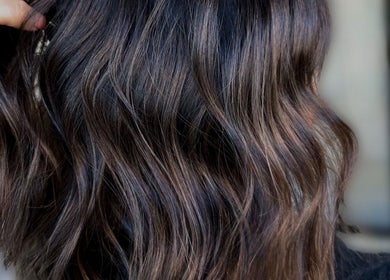 Elegant wavy hairstyle at Accents Hair Studio, Nanaimo, British Columbia, CA.