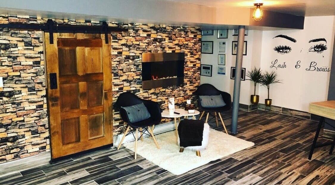 Inviting lounge at Lash Bar 519, featuring rustic decor in Windsor, Ontario, CA.