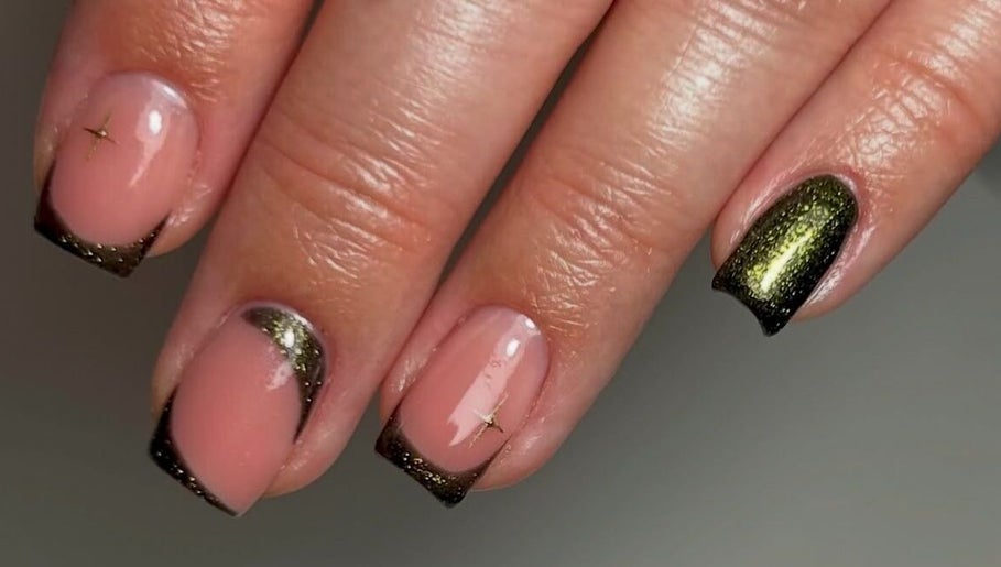 Stylish nail design at Estelle’s Beauty Room, Rugeley, England, GB with pink and black accents.