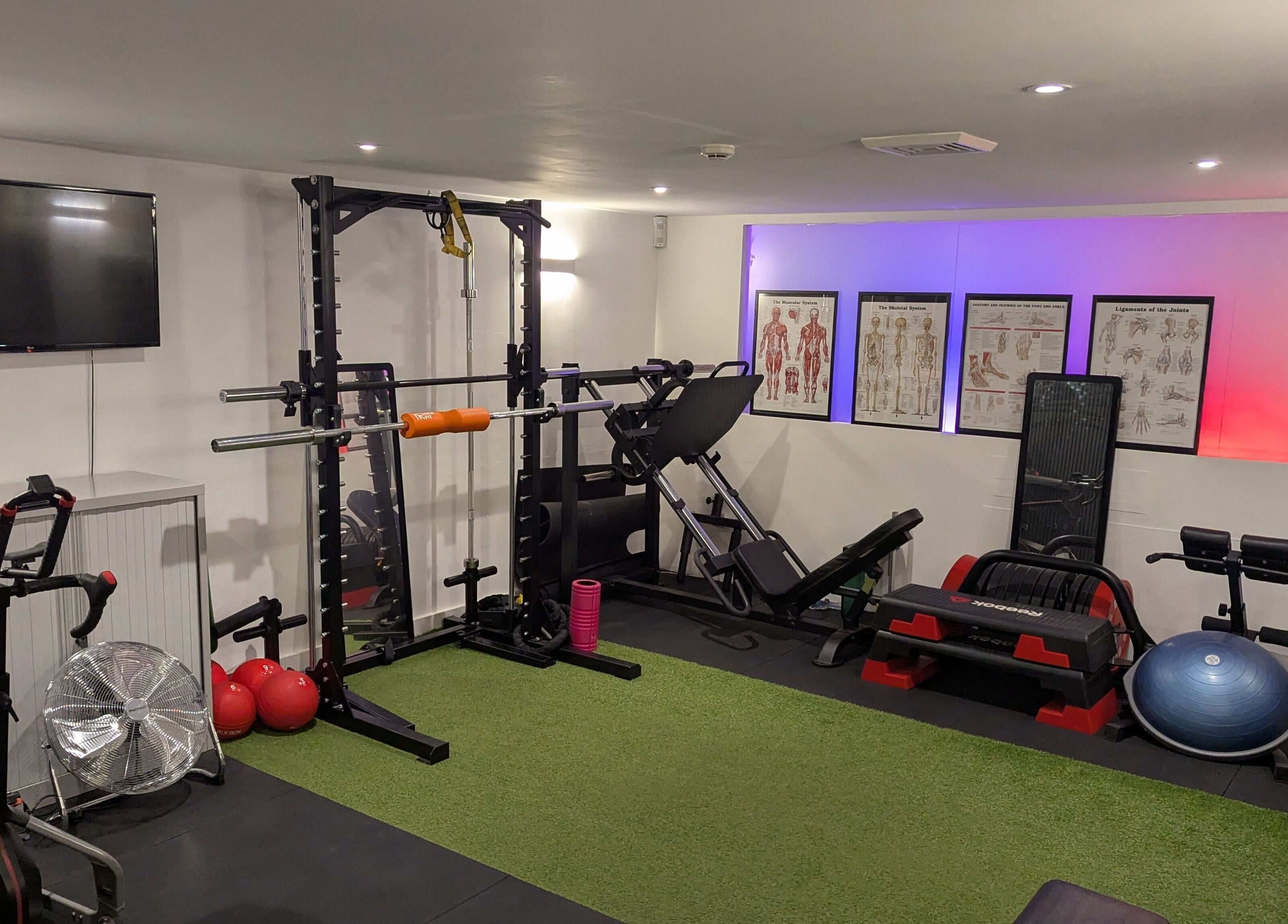 Modern gym equipment setup in M20 Health & Performance, Manchester, England, GB.