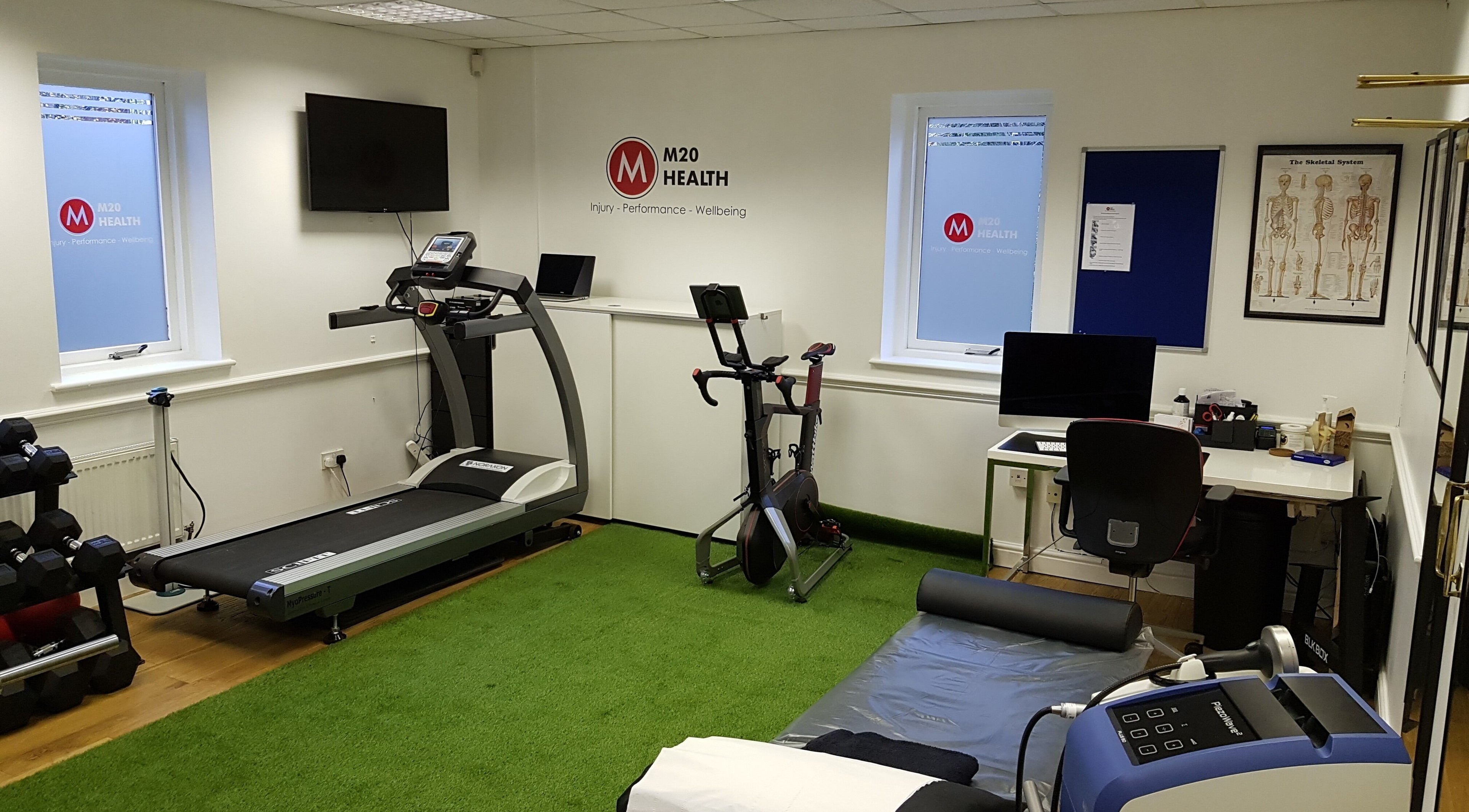 M20 Health & Performance gym interior in Manchester, England, GB showcasing modern fitness equipment.