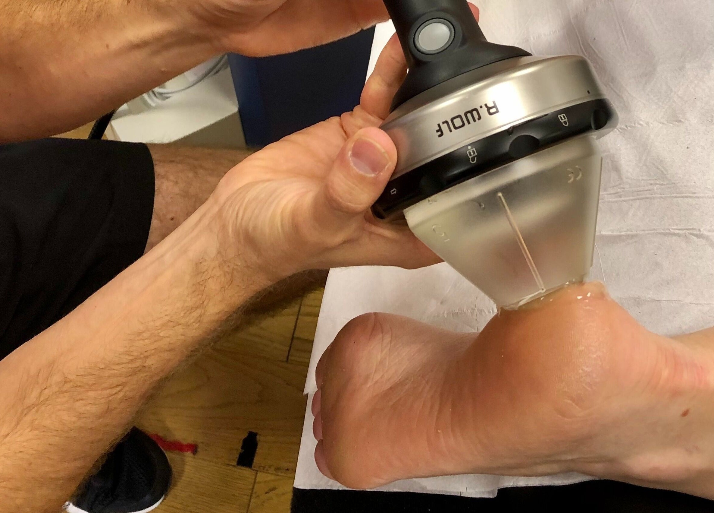 Foot therapy session using advanced equipment at M20 Health & Performance, Manchester, England, GB.