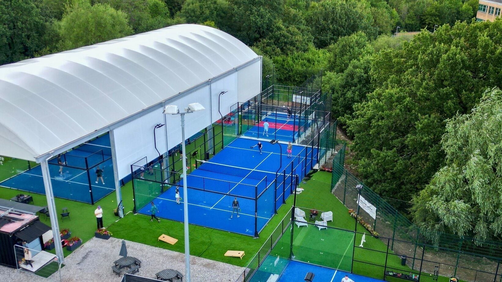 Padel courts at M20 Health & Performance @ MPC, Heald Green, England, surrounded by greenery.