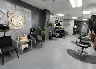 Modern salon interior at Salon 360 Indy, Indianapolis, Indiana, US with stylish chairs and decor.