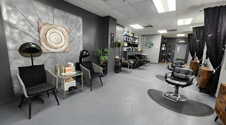 Modern salon interior at Salon 360 Indy, Indianapolis, Indiana, US with stylish chairs and decor.