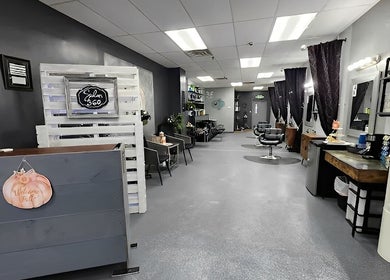 Modern interior of Salon 360 Indy in Indianapolis, Indiana, US, featuring stylish seating and decor.