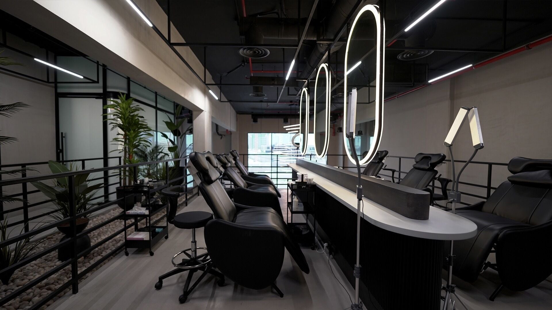 Modern beauty lounge setup at Ink Brows & Beauty - Khobar, Al Khobar, Eastern Province, SA with elegant chairs.