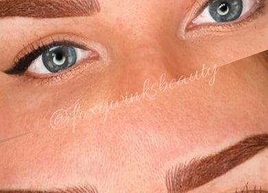 Close-up of expertly shaped brows at FoxyWinks Beauty in Bowmanville, Ontario, CA.