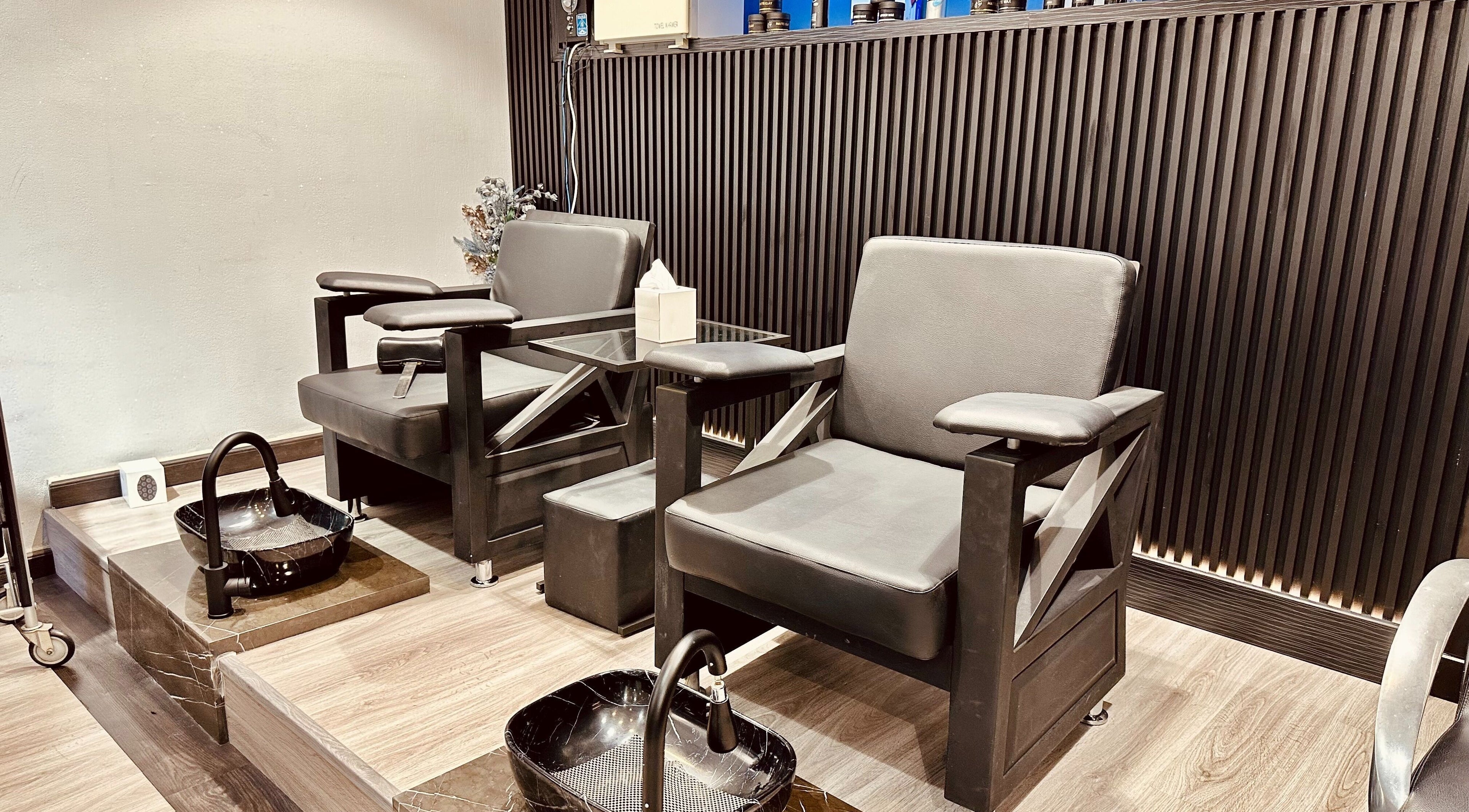 Luxurious pedicure chairs at Shadow Chic Gents Salon, Dubai, Dubai, AE, offering premium relaxation.