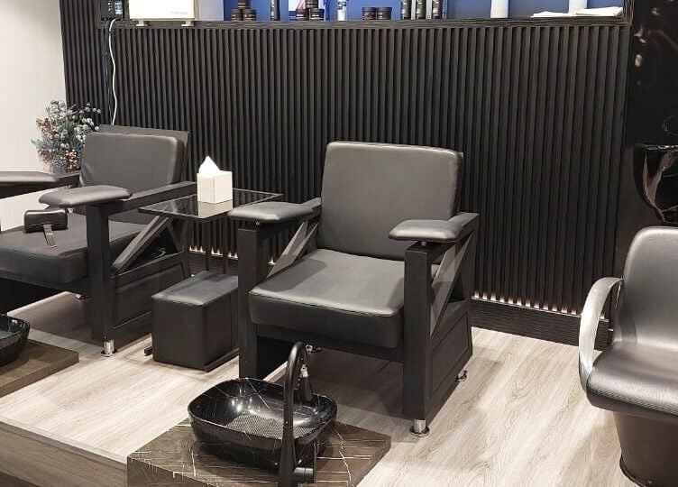 Elegant pedicure chairs at Shadow Chic Gents salon, Dubai, Dubai, AE, showcasing modern luxury and comfort.