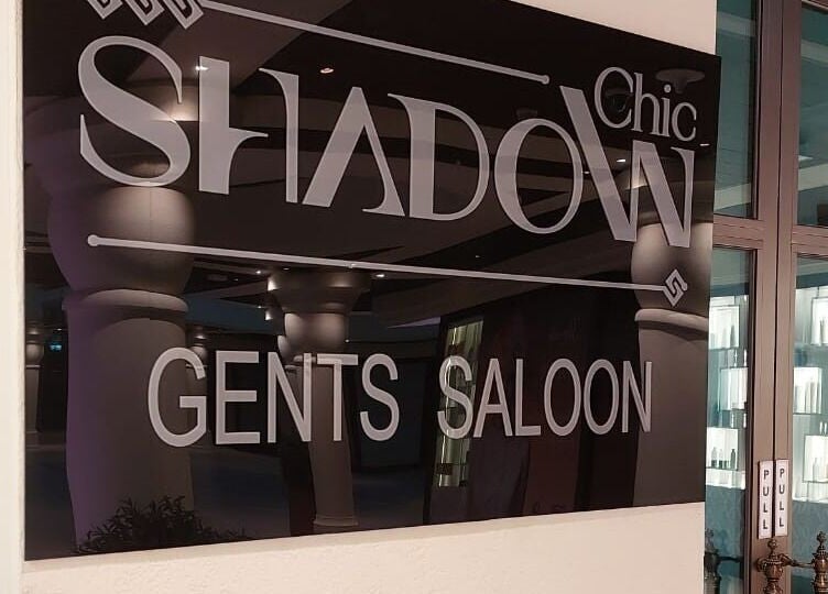 Entrance sign of Shadow Chic Gents salon in Dubai, Dubai, AE, showcasing chic design.