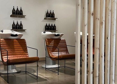 Modern salon chairs at Cuttlefish Eco Salon - Hove, Brighton And Hove, England, GB, with eco-friendly products.