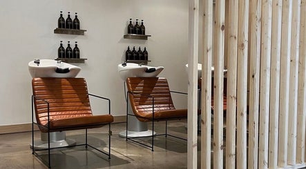 Modern salon chairs at Cuttlefish Eco Salon - Hove, Brighton And Hove, England, GB, with eco-friendly products.