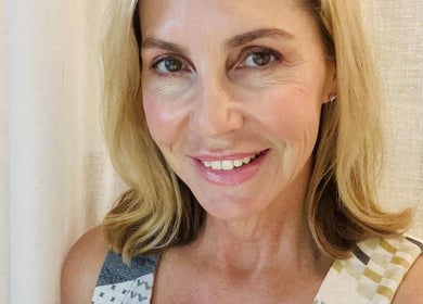 Smiling person at Society Isle Beauty and Wellbeing, Bulimba, Queensland, AU exuding warmth and relaxation.