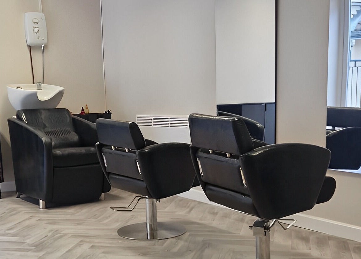 Elegant salon chairs at Omree Laser and Aesthetics in Stoke-on-Trent, England, GB, showcasing modern design.