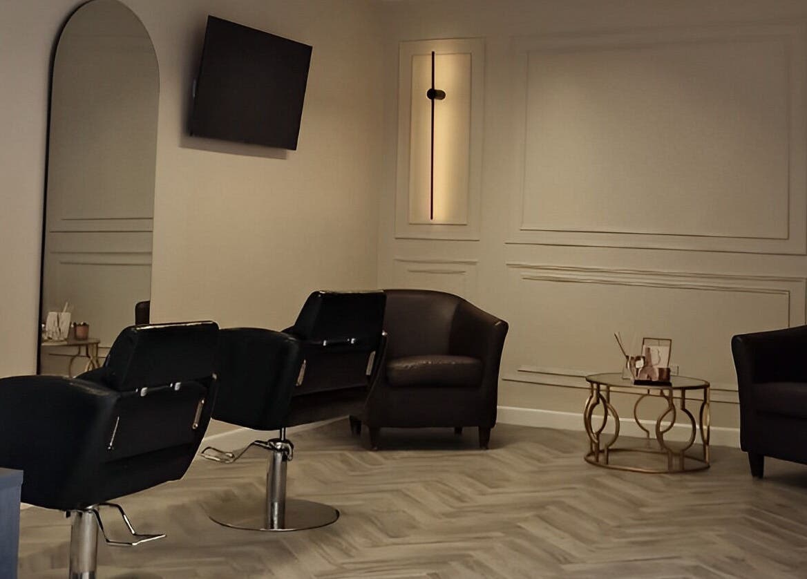 Chic salon interior at Omree Laser and Aesthetics, Stoke-on-Trent, England, GB with stylish seating area.