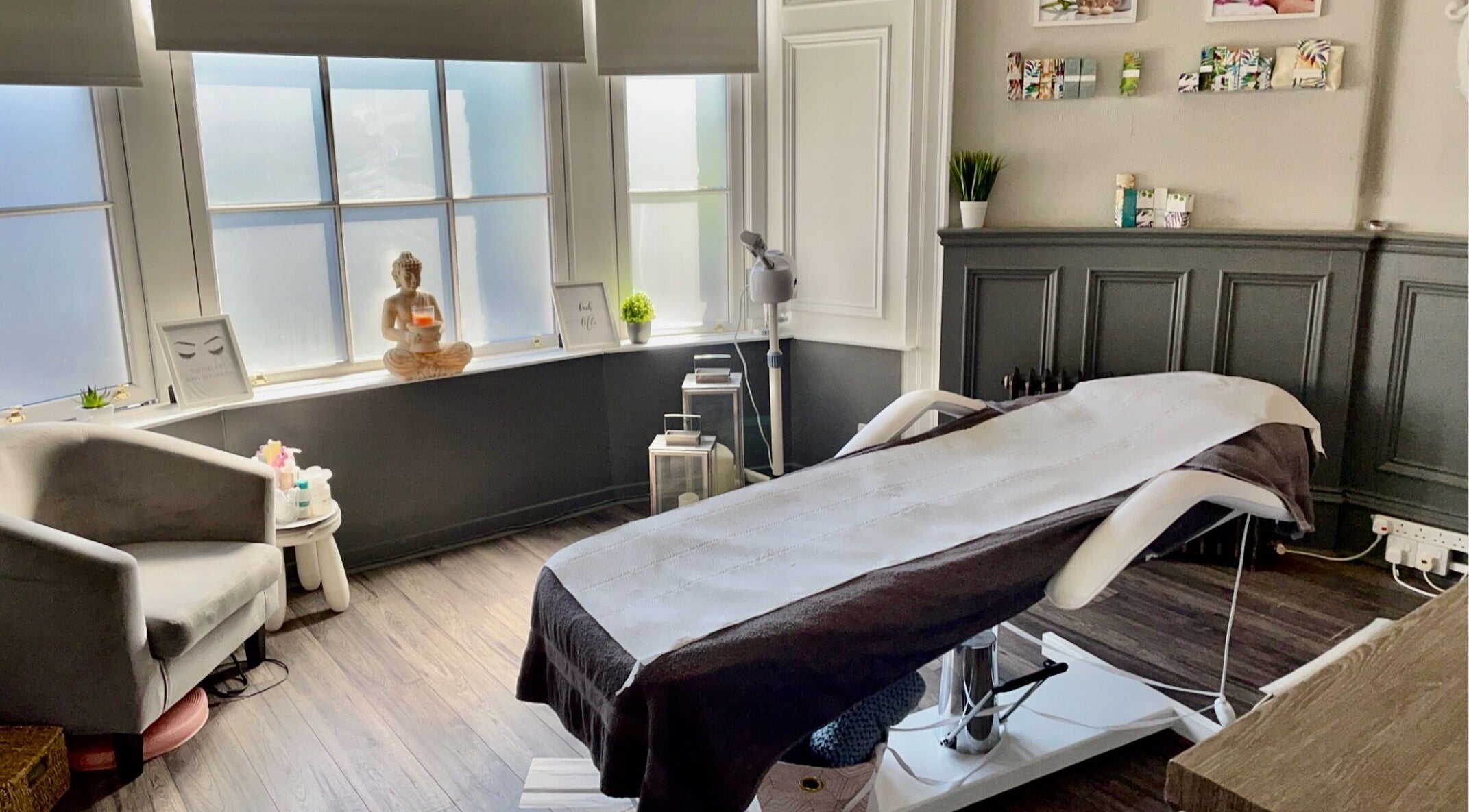 Relaxing spa treatment room at Cls Nails & Beauty Therapies, Ayr, Scotland, GB, with a plush chair and treatment bed.