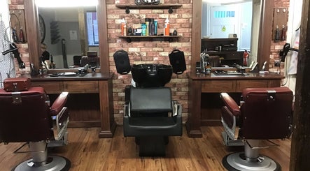 Comfortable barber chairs and setup at Rileys Barbers in Manningtree, England, GB. Inviting interior design.