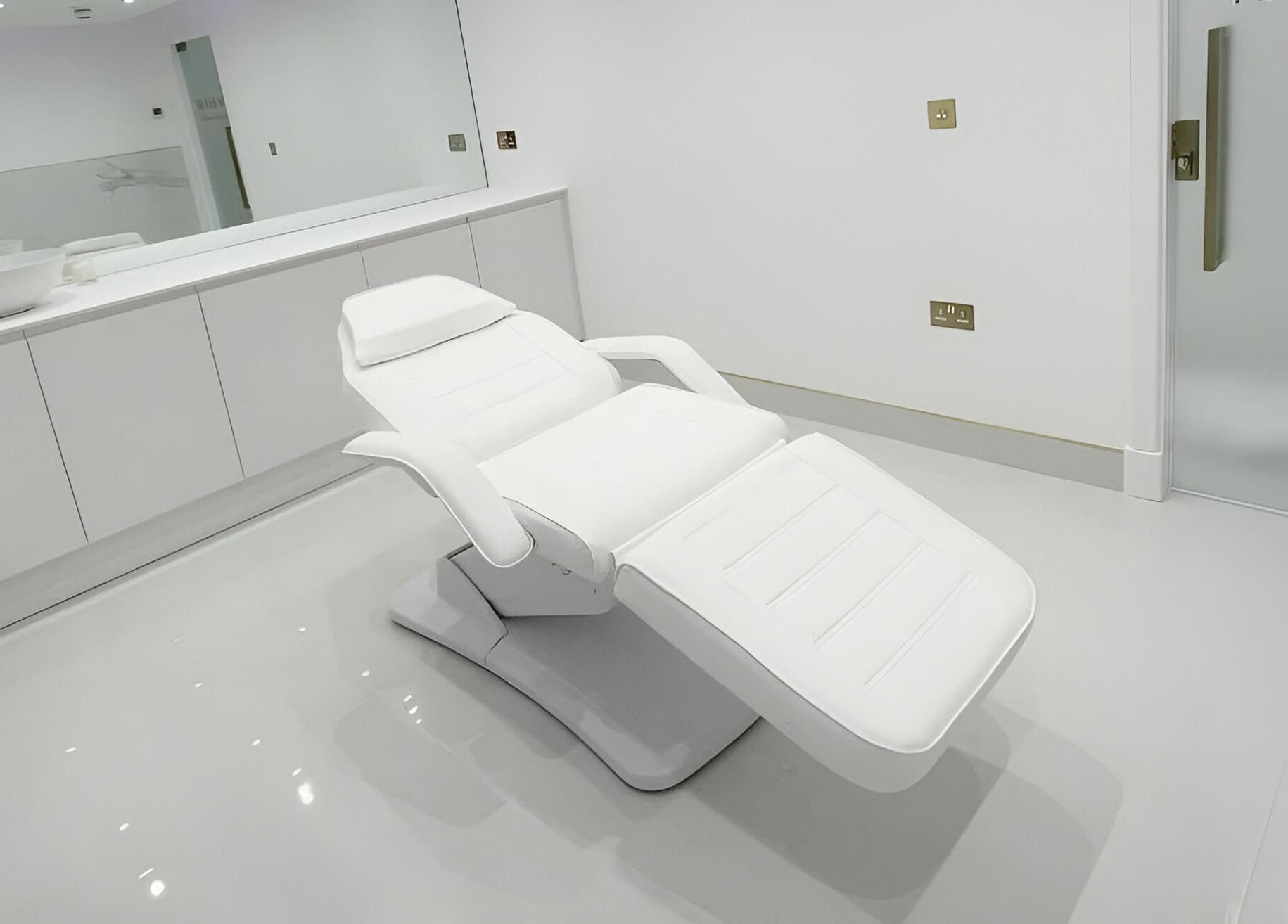 Modern treatment room at Mediface Medical Aesthetics and Skin Clinic in Doncaster, England, GB with sleek design.