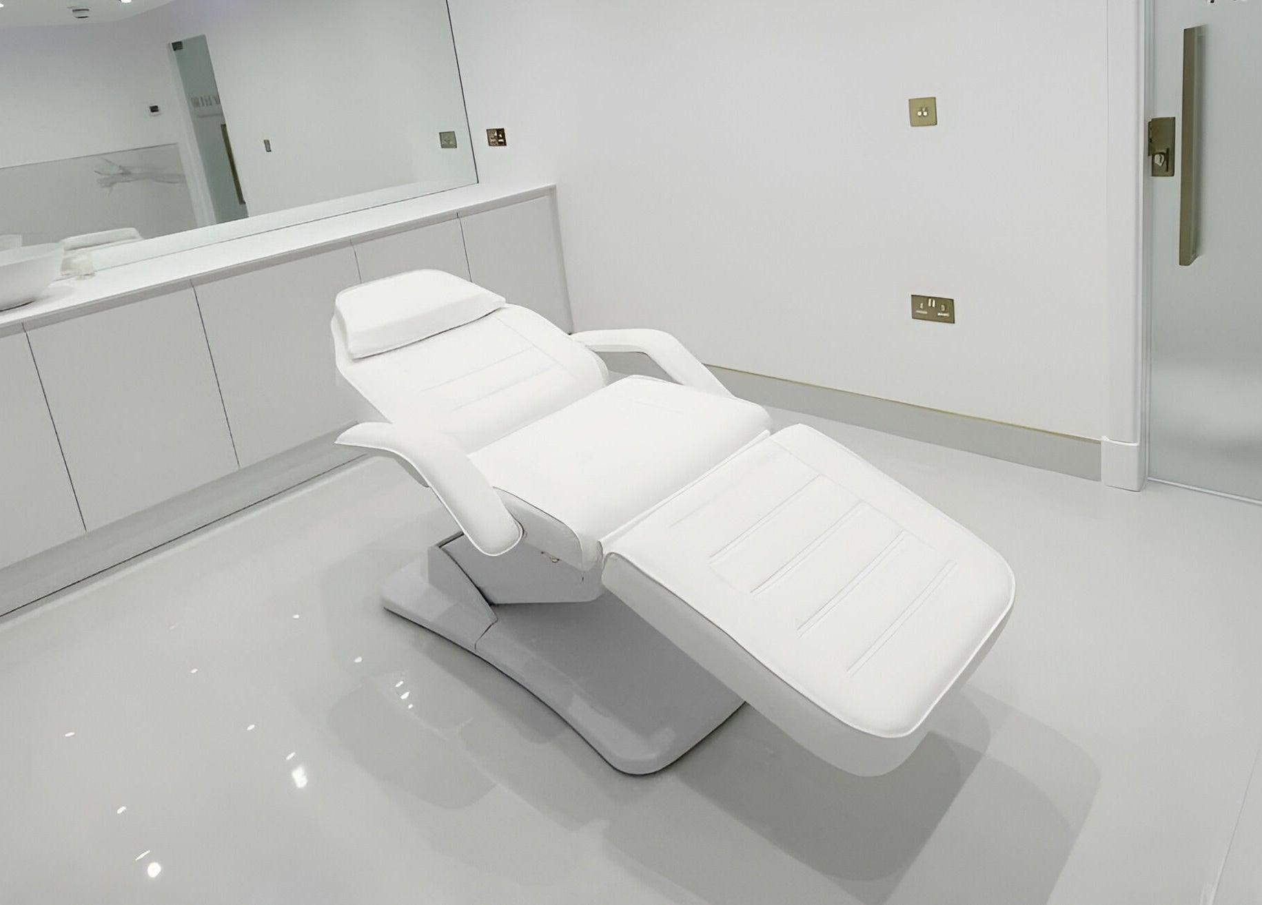 Modern treatment room at Mediface Medical Aesthetics and Skin Clinic in Doncaster, England, GB with sleek design.