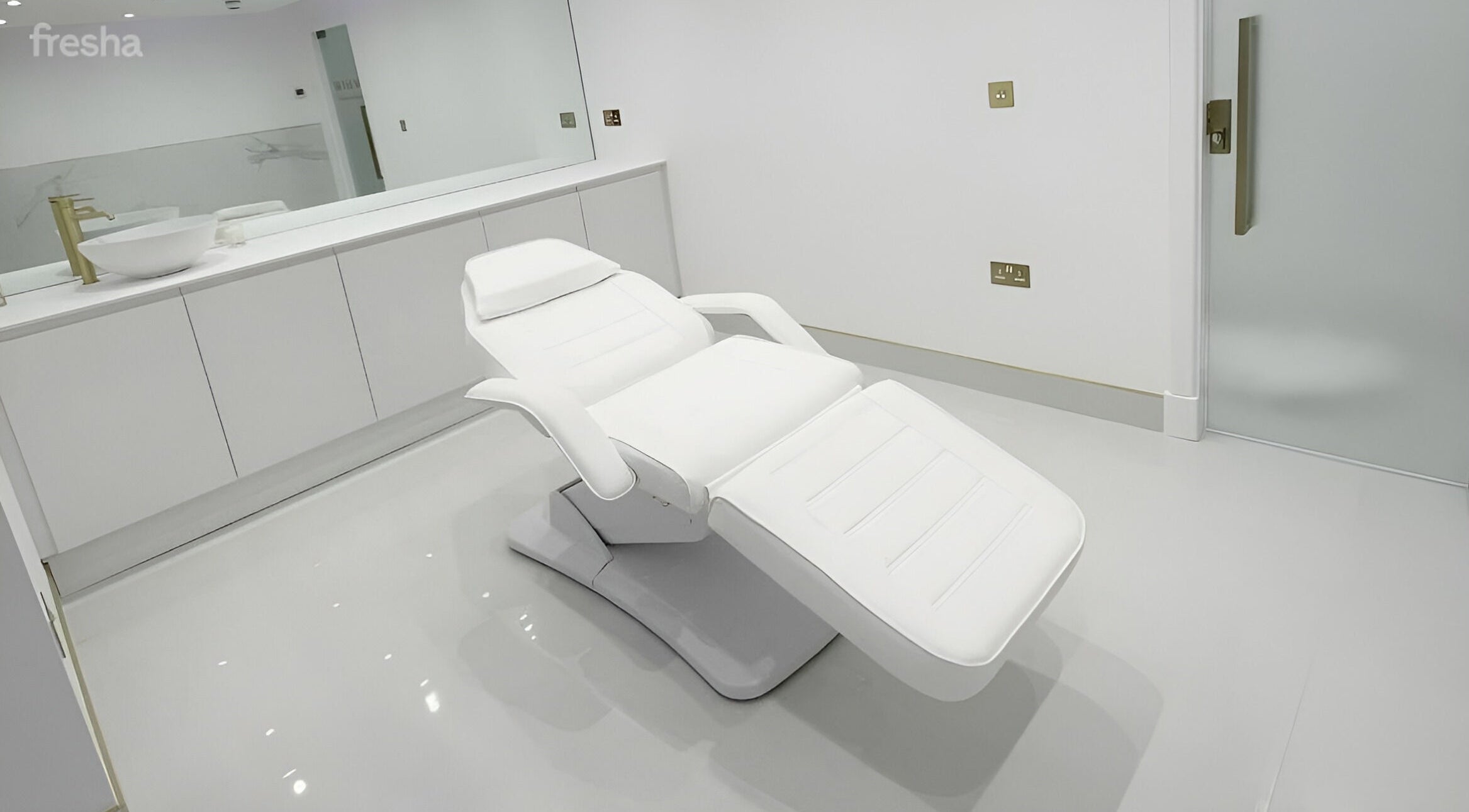 Modern treatment room at Mediface Medical Aesthetics and Skin Clinic in Doncaster, England, GB with sleek design.