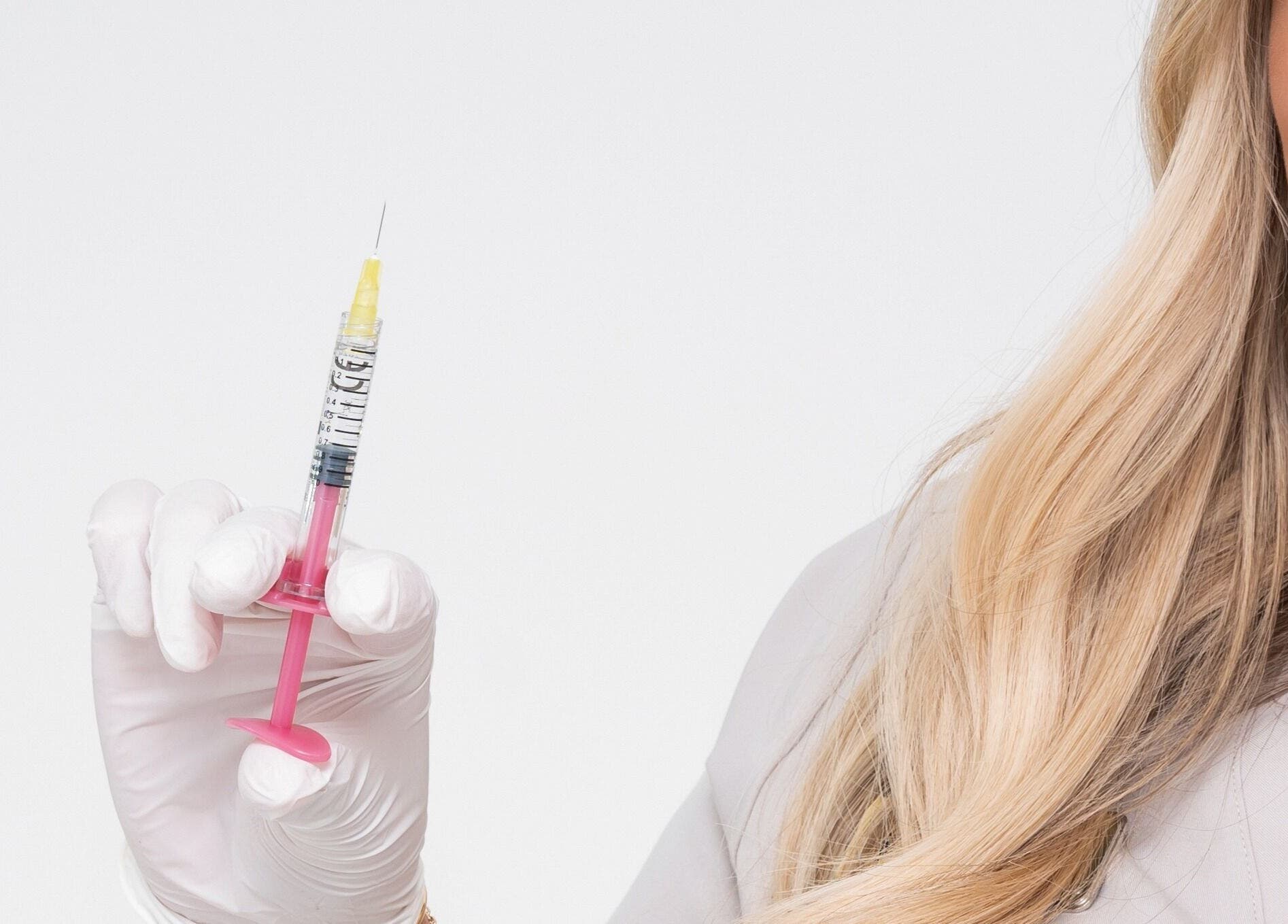 Aesthetic professional holding syringe at Mediface Medical Aesthetics and Skin Clinic, Doncaster, England, GB.