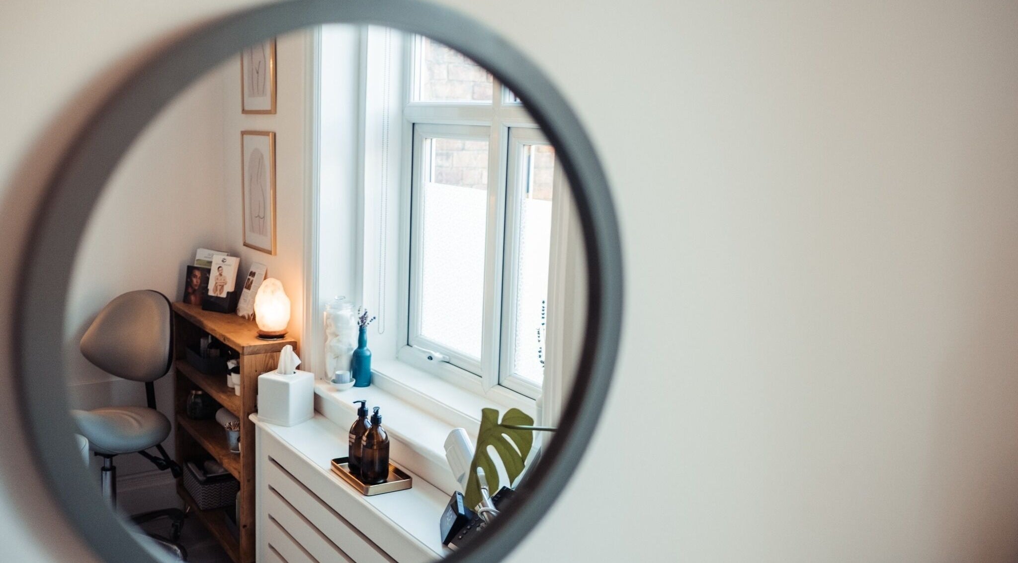 Cozy treatment room at Earth Glow Skin Clinic - Northampton, featuring a serene ambiance with modern decor.