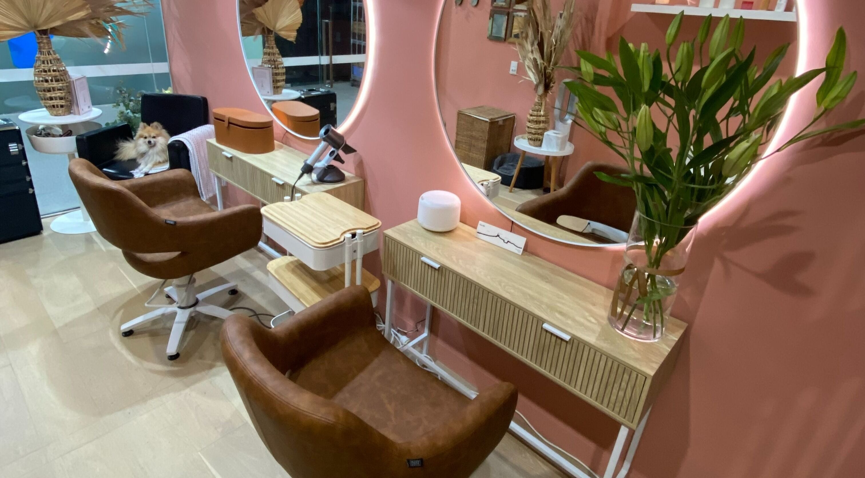 Elegant salon interior at Rachel French Hairdresser, Sydney, New South Wales, AU, with plush chairs and stylish decor.