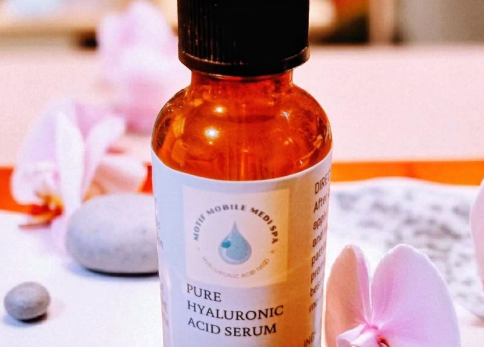 Motif Medi Spa's hyaluronic acid serum with orchids at Nassau, New Providence, BS.