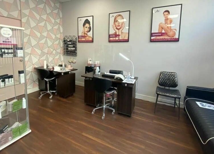 Stylish interior of Ami Brow and Lash Bar in Rugby, England, GB featuring elegant workstations and decor.