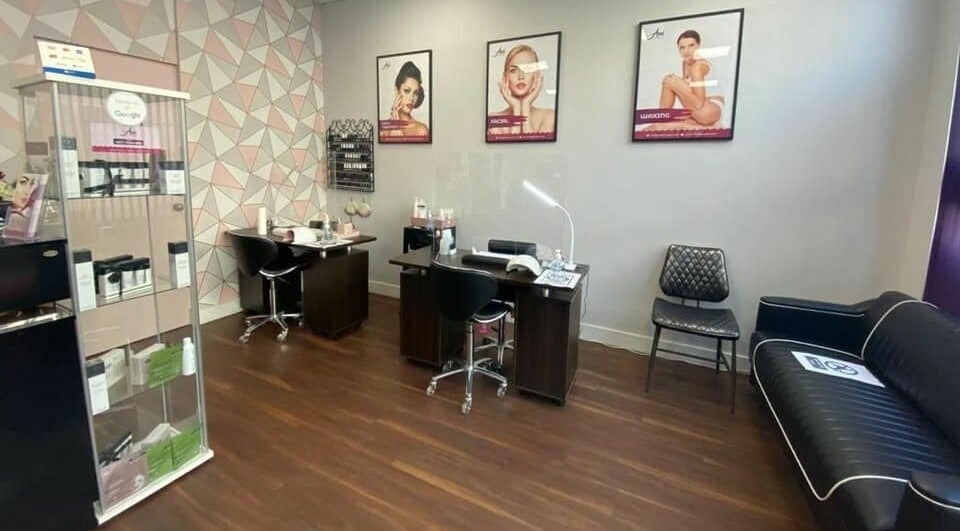 Stylish interior of Ami Brow and Lash Bar in Rugby, England, GB featuring elegant workstations and decor.