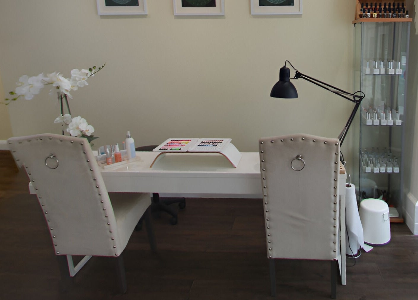 Elegant nail care setup at Natural Body Cafe, Poole, England, GB. Features cozy chairs and modern decor.