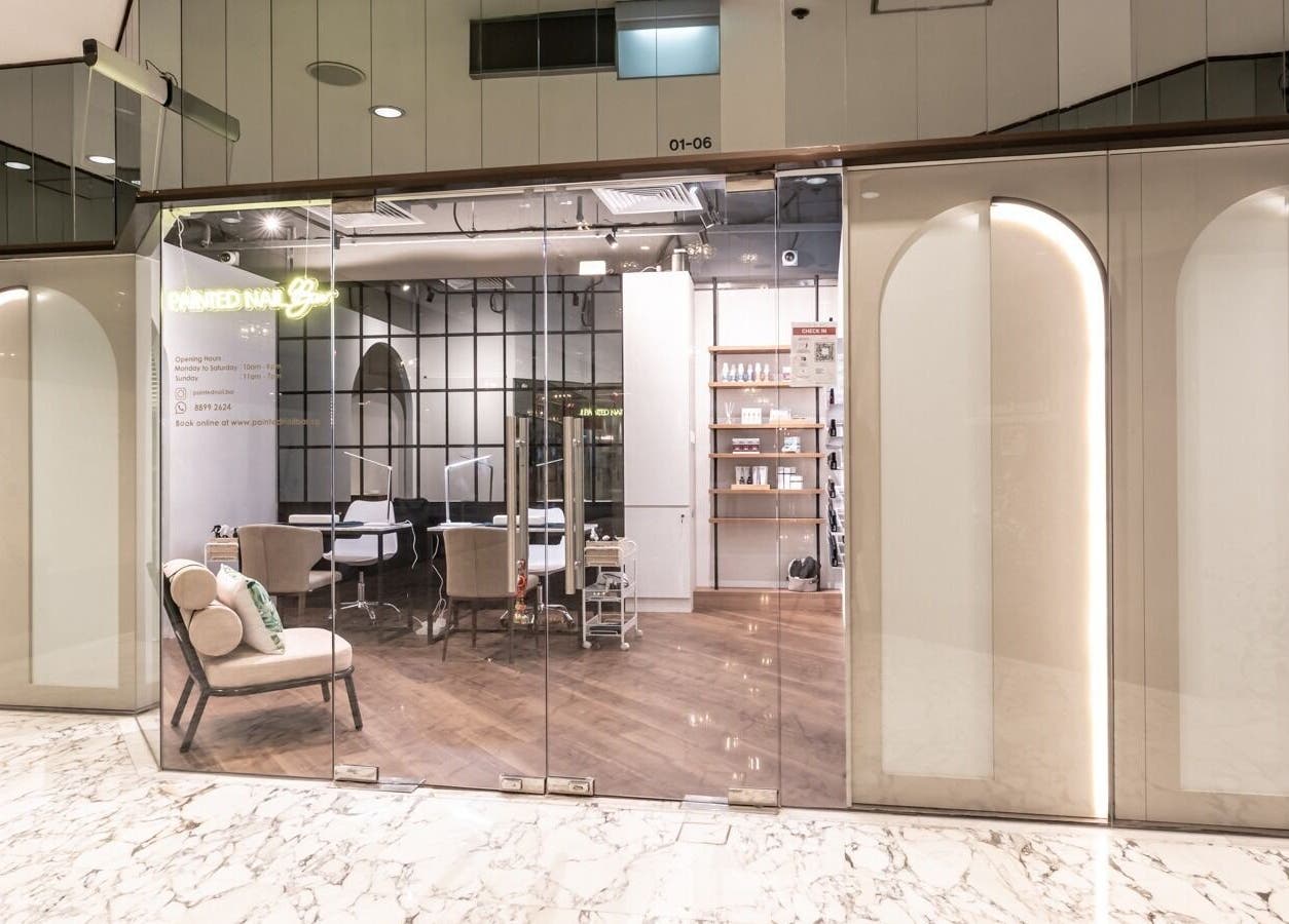 Elegant interior of Painted Nail Bar at Delfi Orchard on Orchard Road, Singapore, SG showcasing a modern design.