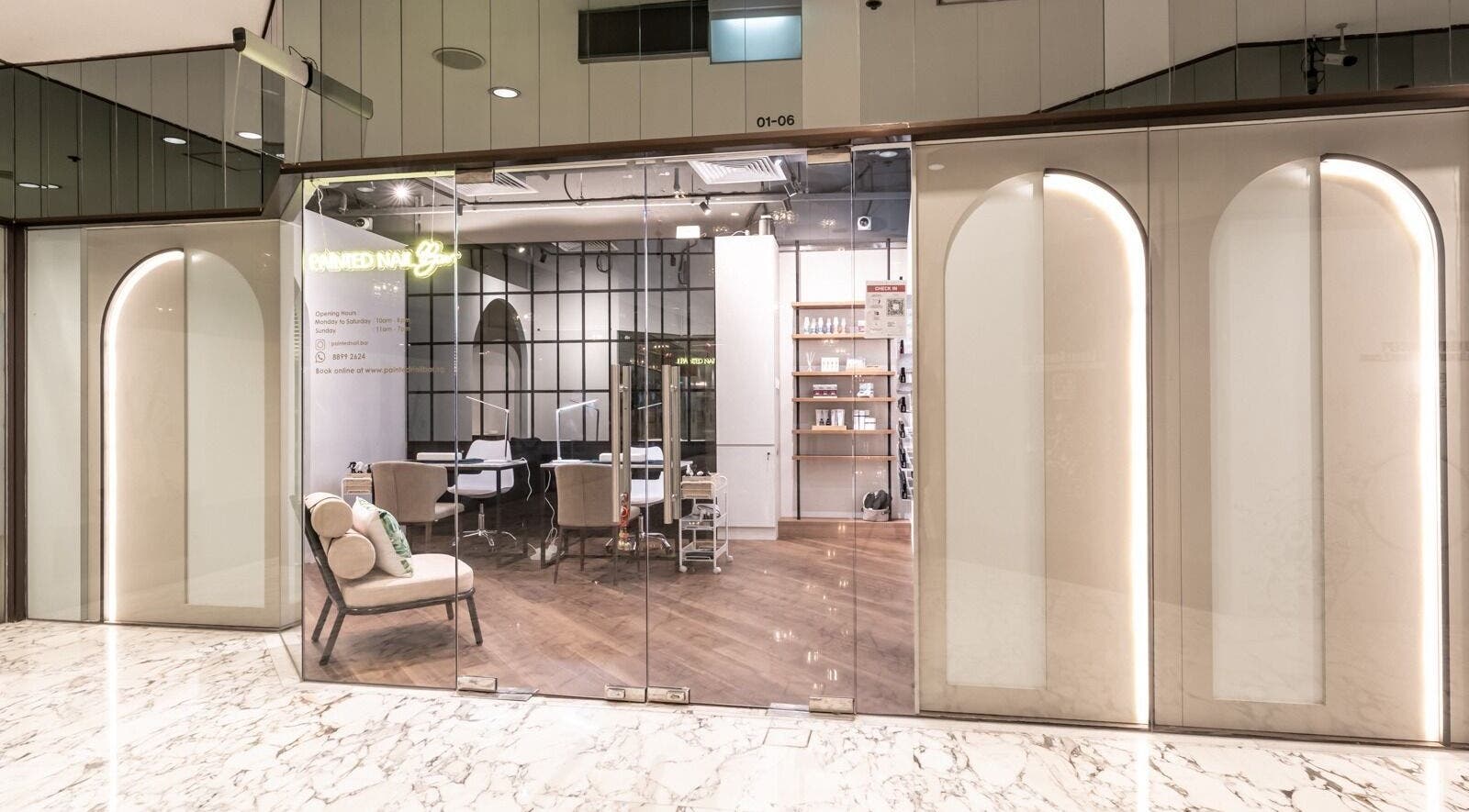 Elegant interior of Painted Nail Bar at Delfi Orchard on Orchard Road, Singapore, SG showcasing a modern design.