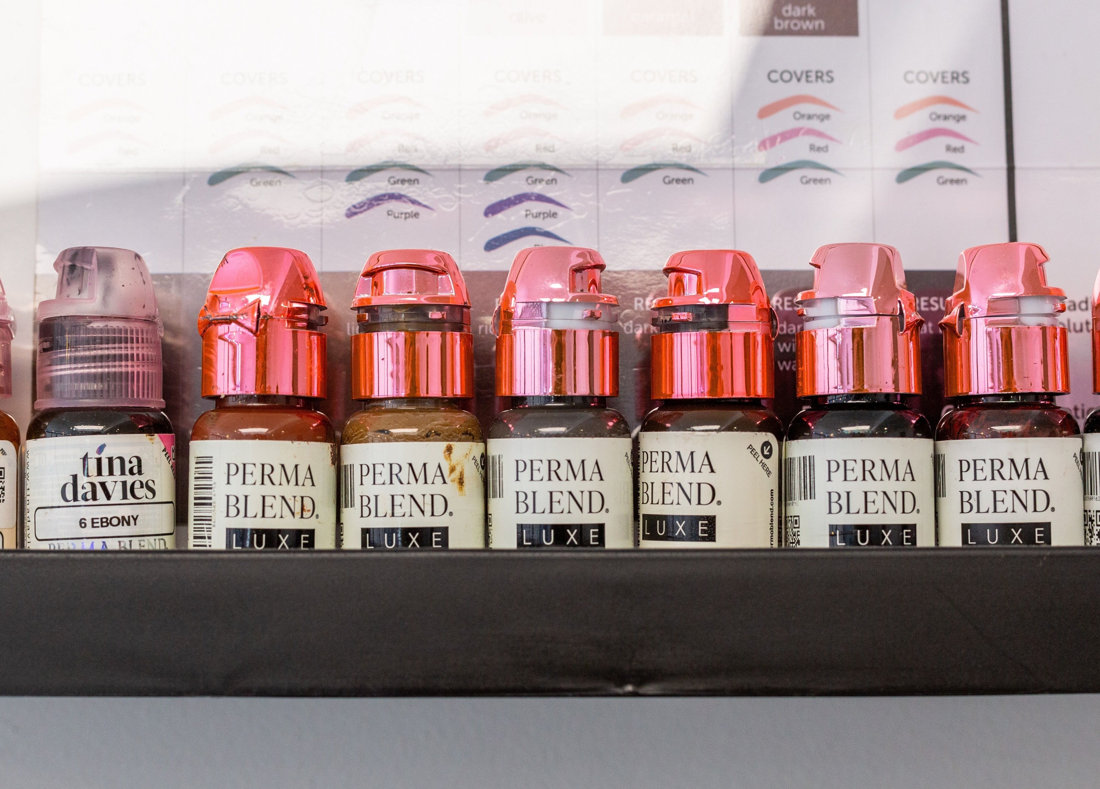Pigment bottles at Bespoke Brow Design, Rustington, England, enhancing beauty treatments.