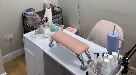Hairspray nail station in Bingley, England, GB with organized beauty tools and products.