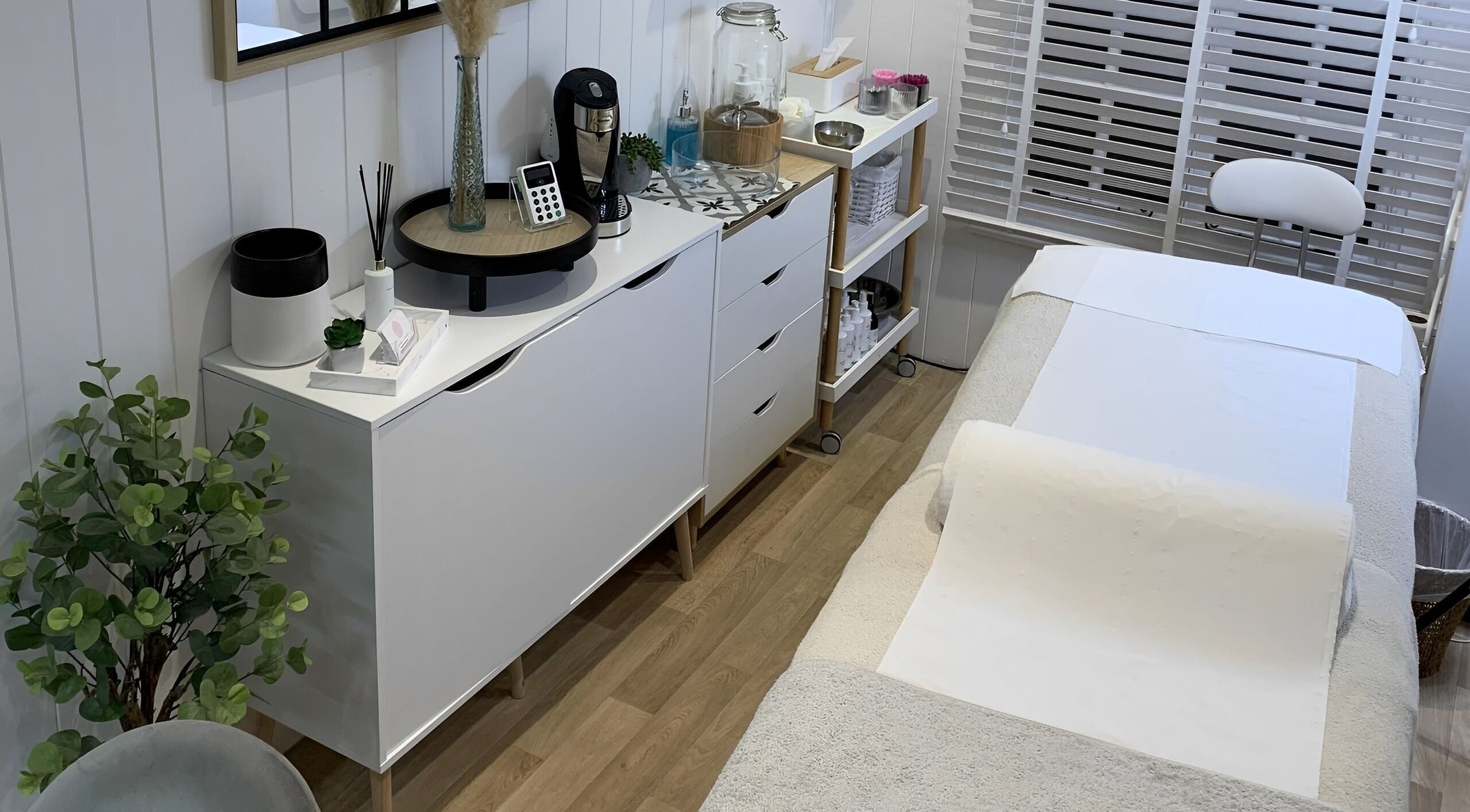 Tranquil treatment room at The Beauty Hut, Wivelsfield Green, England, GB. Cozy and inviting ambiance.